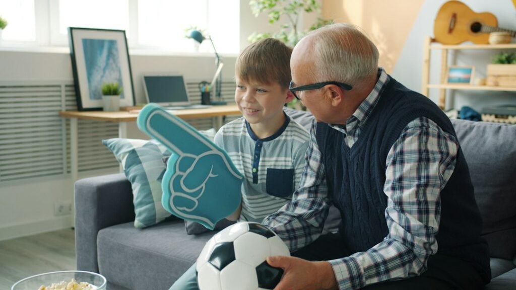 Family enjoying television at home for IPTV versus cable comparison